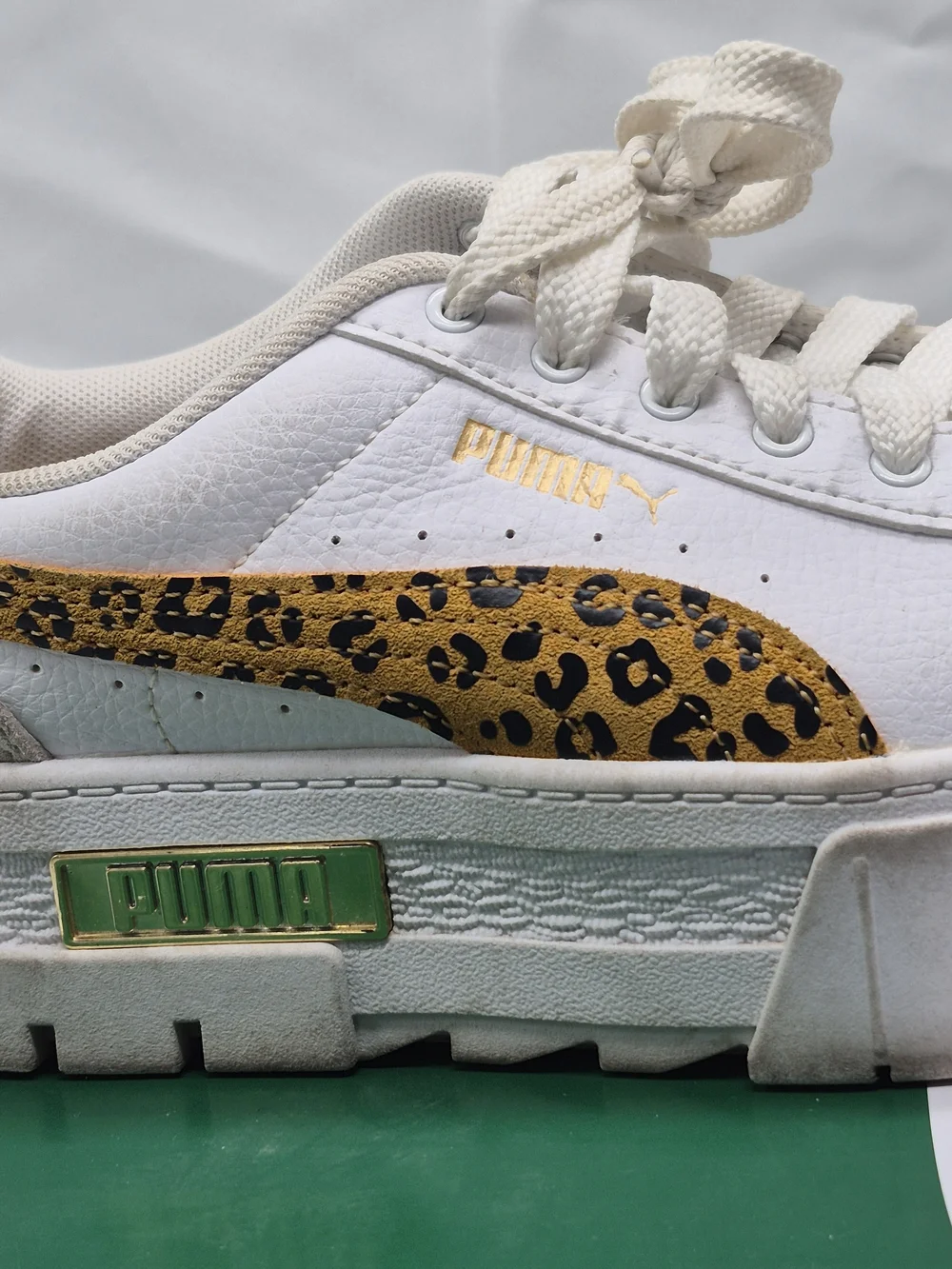 PUMA Kids' White Platform Sneaker with Leopard Accent